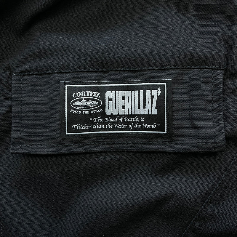 Calça Corteiz Guerillaz Cargo Triple Black Logo